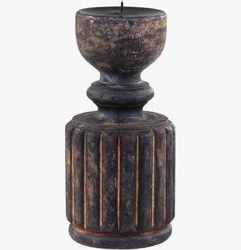 Foto av rustik ljusstake med antik design och patina