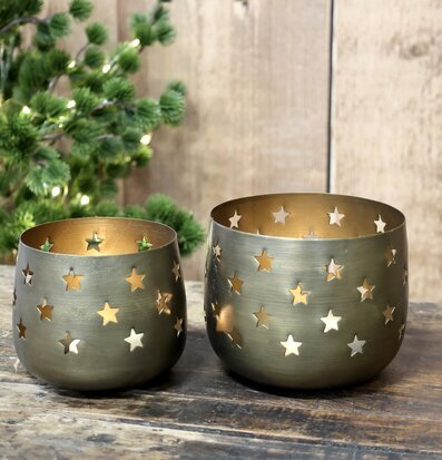 Bild av antika mässingsljuslyktor med stjärnmönster