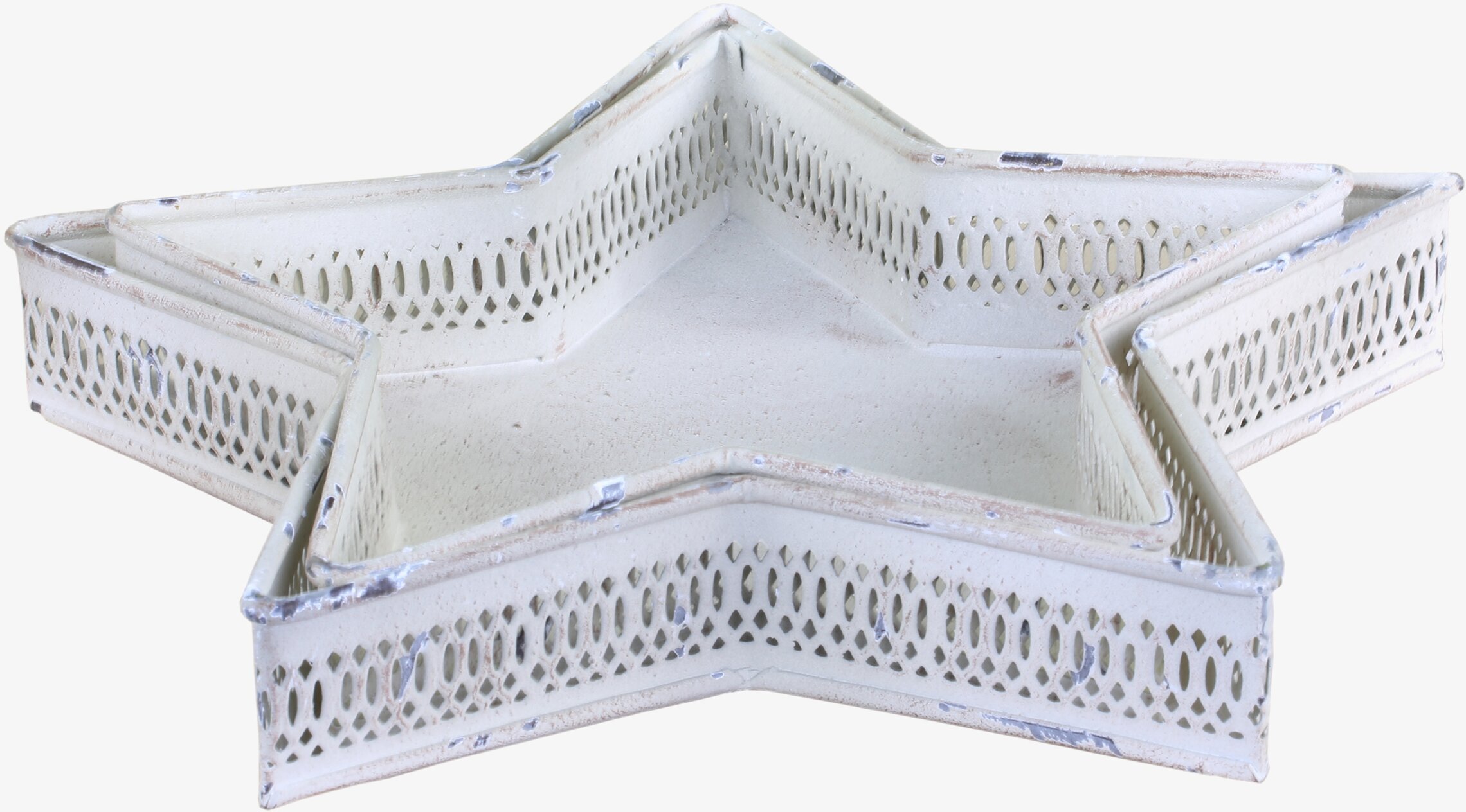 Bild av dekorativt antikt krämfärgat stjärnformat fat