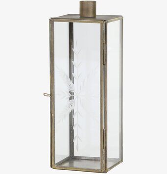 Bild av ljusstake i antik mässing med glasdetaljer