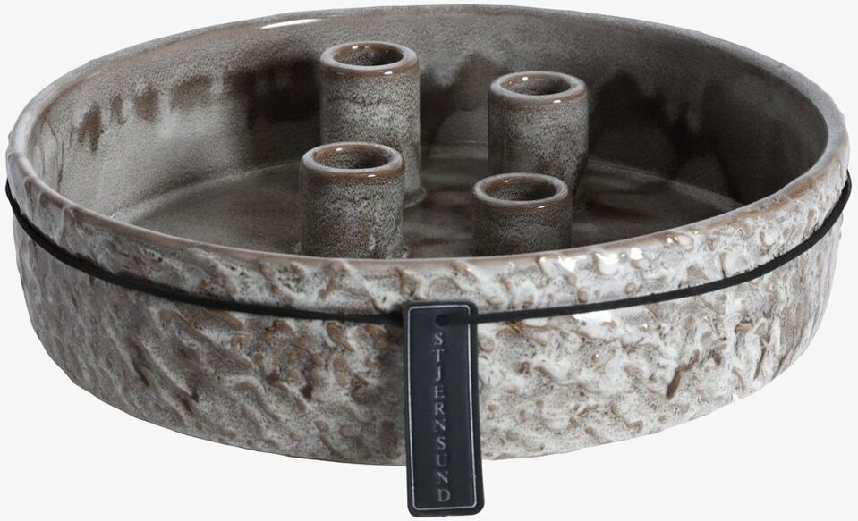 Foto av stilren ljusstake i keramik med naturtoner