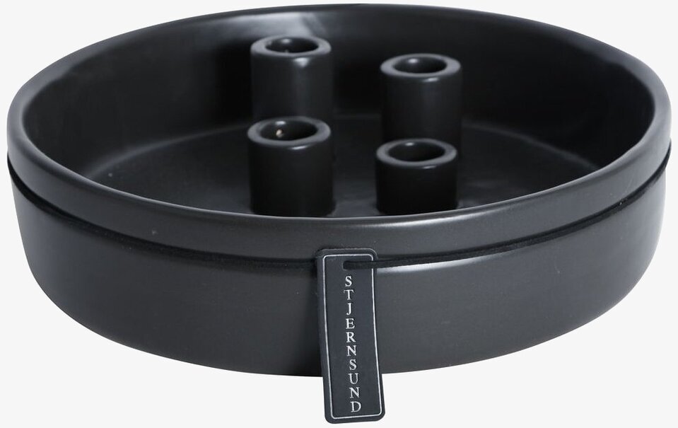 Bild av stilren och modern svart ljusstake för hemmet