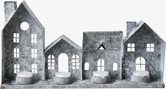 Bild av unik ljuslykta med små hus och grå metall