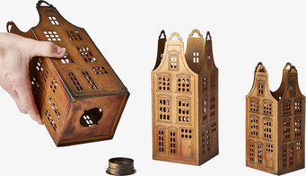 Bild av tre stilistiska ljuslyktor i metallisk design