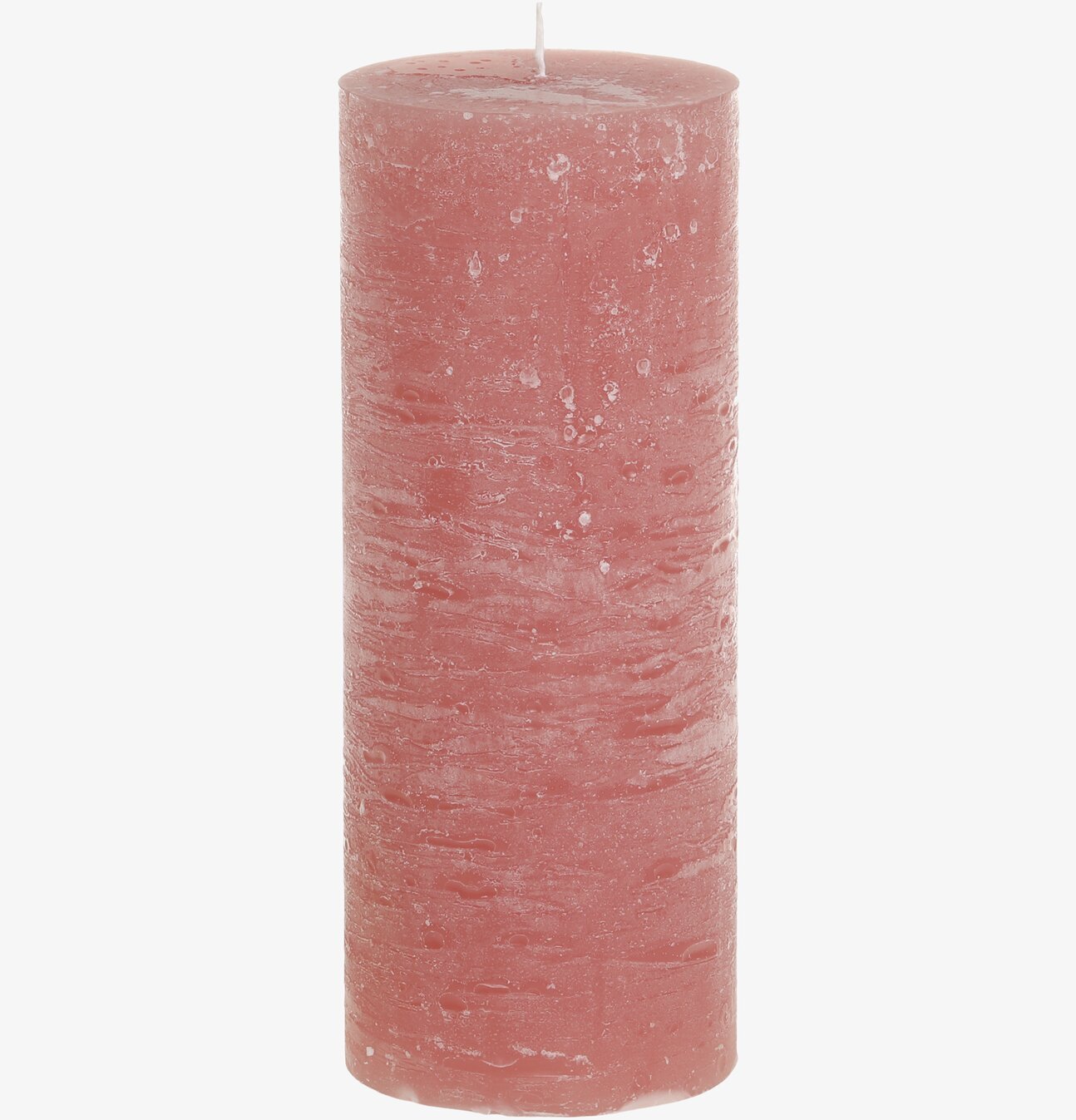 Bild av rustikt blockljus med hallonröd nyans