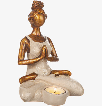 Bild av stämningsfull ljushållare i yogaposition