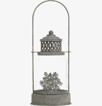 Bild av en antik zink ljuslykta med elegant design