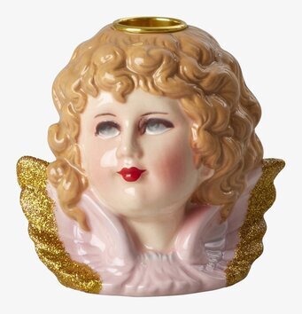 Bild av detaljrik ljushållare med änglaansikte