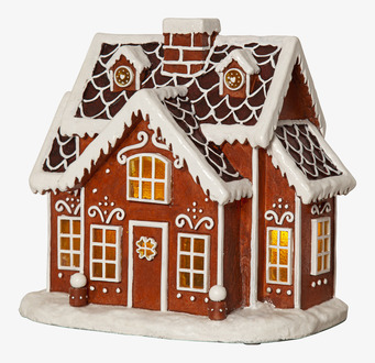 Foto av ingefärsstuga med LED-belysning och julkänsla