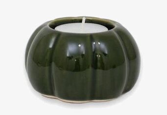 Bild av elegant grön ljuslykta med naturinspirerad design