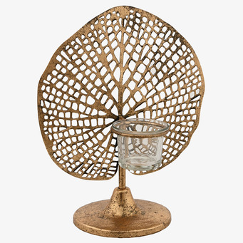 Bild av elegant ljushållare i guld med stiliserat löv