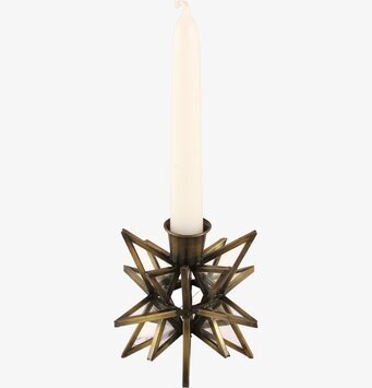 Bild av antik ljushållare med stjärnform och glasdetaljer