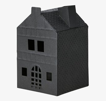 Bild av svart ljuslykta formad som ett stiliserat hus