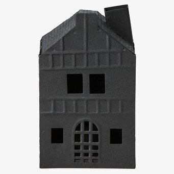 Bild av svart ljuslykta i form av hus med detaljer