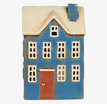 Foto av ljuslykta i form av ett blått hus med detaljer