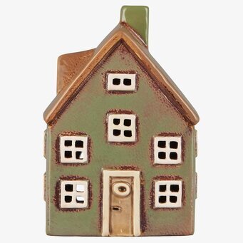 Bild av en charmig dekorativ ljuslykta som husmodell