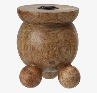 Foto av en elegant ljusstake med naturlig trädesign