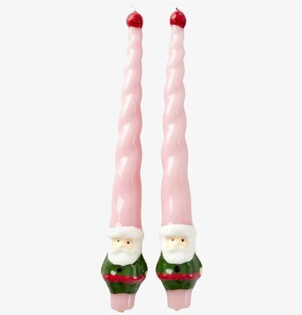 Bild av lekfulla tomteljus med unik design och färg