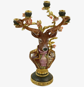 Foto av unik ljusstake med hjortmotiv och eleganta detaljer