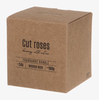 Bild av doftljusförpackning i naturlig och stilren design