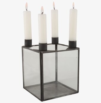 Foto av elegant ljusstake i glas och antik metall