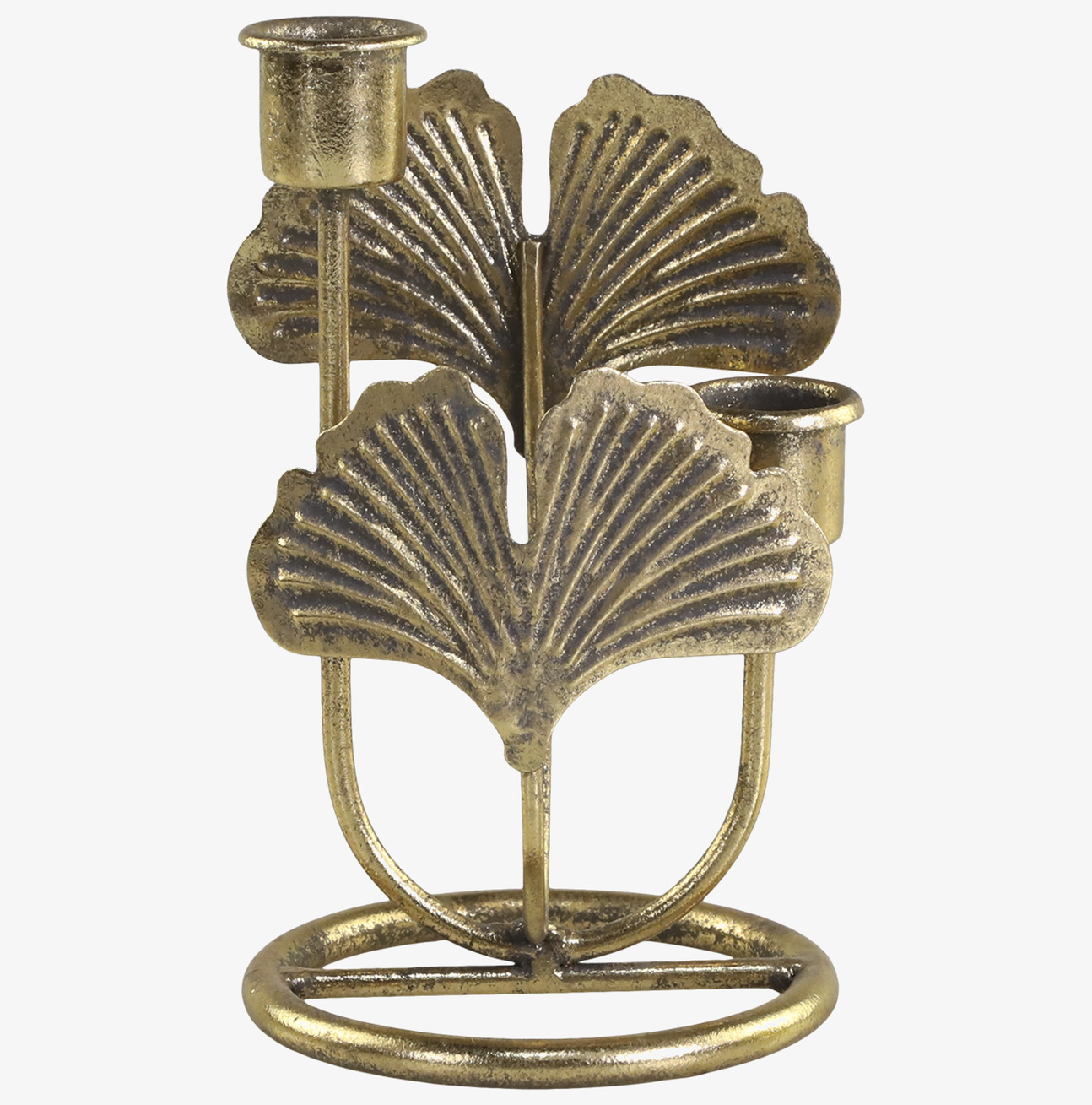 Bild av antik mässingsljusstake med naturinspirerad design