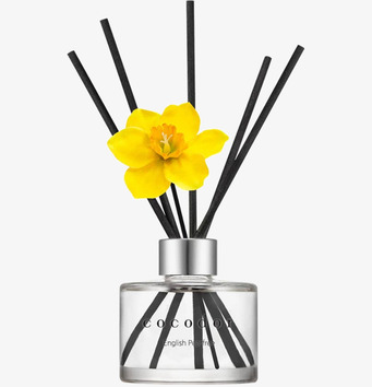 Bild av elegant doftspridare med gul blomma och silverkork