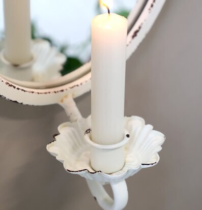 Bild av elegant väggspegel med blomformad ljushållare