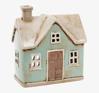 Bild av ljuslykta i traditionellt husdesign med detaljer