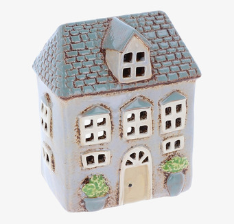 Bild av ljuslykta i form av ett charmigt miniatyrhus