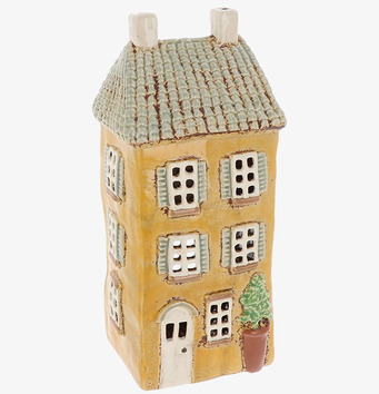 Bild av charmig ljuslykta i form av trevåningshus