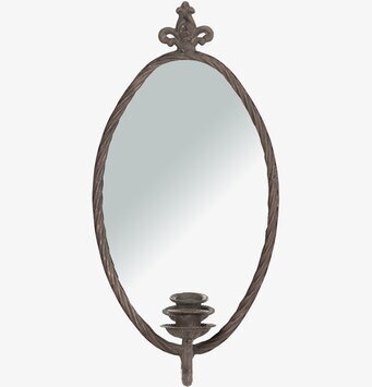 Bild av elegant ljuslampett med spegel och metallram