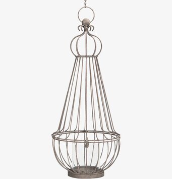 Bild av en elegant ljuslykta i metall och glas