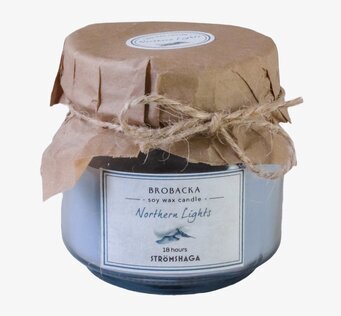 Bild av doftljus i naturliga toner och stilren design