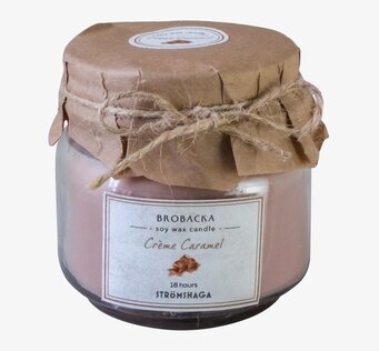 Bild av rustikt doftljus i glasburk med caramel-ton