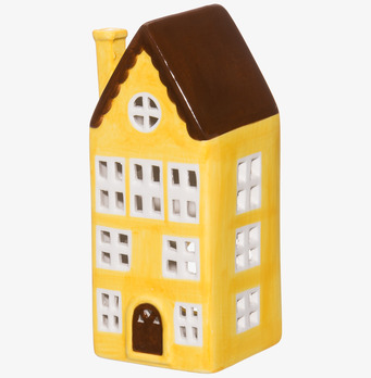 Bild av charmig ljuslykta i form av ett gult hus