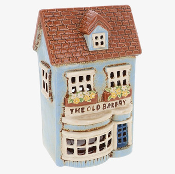 Bild av ljuslykta som föreställer en gammaldags byggnad