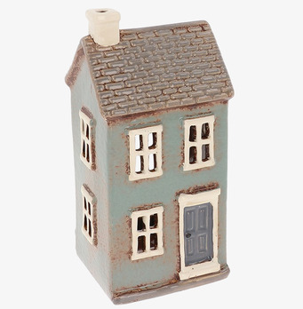 Bild av dekorativ ljuslykta i form av ett litet hus