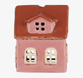 Bild av dekorativ rosa ljuslykta i form av litet hus