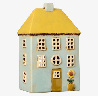 Bild av keramiskt ljushus med blå fasad och gula detaljer