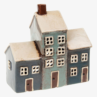 Bild av keramiklykta som föreställer tre stadshus i rad