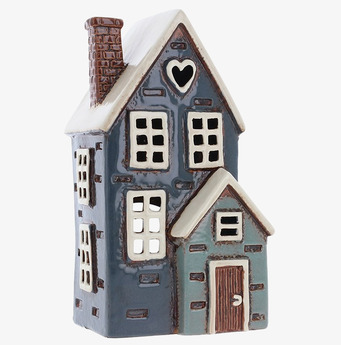 Bild av dekorativ ljuslykta i form av keramikhus med veranda