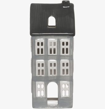 Bild av keramisk ljuslykta i form av stiliserat grått hus