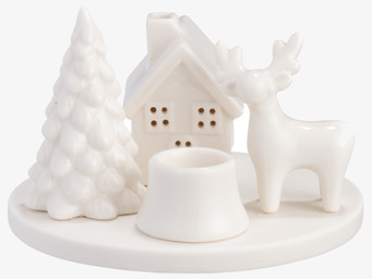 Bild på vit rund ljusstake med vinterlandskap och djurmotiv