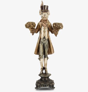 Bild på detaljrik ljusstake i guld med aristokratisk mus