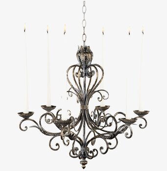 Bild på elegant ljuskrona med sex tända ljus och antik finish