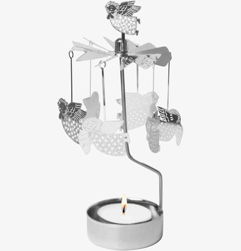 Bild av dekorativ ljuslykta med snurrande änglaspel i metall