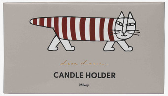 Bild på stilren förpackning med randig katt och ljusstake