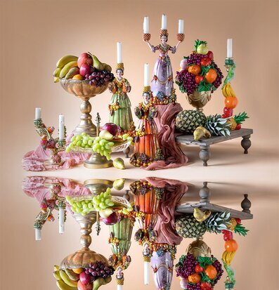 Foto: Stilleben med fruktljusstakar och reflektion