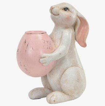 Foto: Hareljusstake med rosa lyktskål i studiovit bakgrund